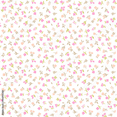 Cute floral pattern in the small flowers. Seamless vector texture. Elegant template for fashion prints. Printing with small pink and coral flowers. White background.