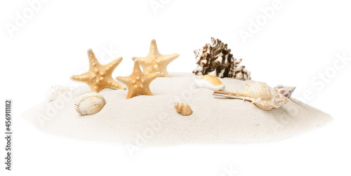 Fotografía Beautiful sea stars and seashells in sand on white background