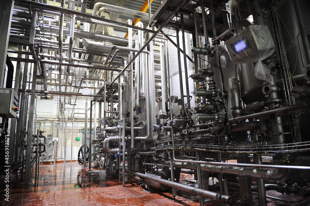 Almaty, Kazakhstan - 07.06.2016 : Pipes in the halls for fermentation and brewing of beer at the plant Almaty, Kazakhstan - 07.06.2016 : Pipes in the halls for fermentation and brewing of beer at the plant