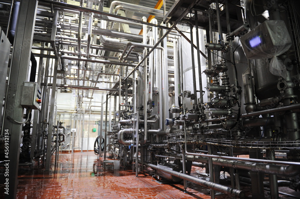 Almaty, Kazakhstan - 07.06.2016 : Pipes in the halls for fermentation and brewing of beer at the plant