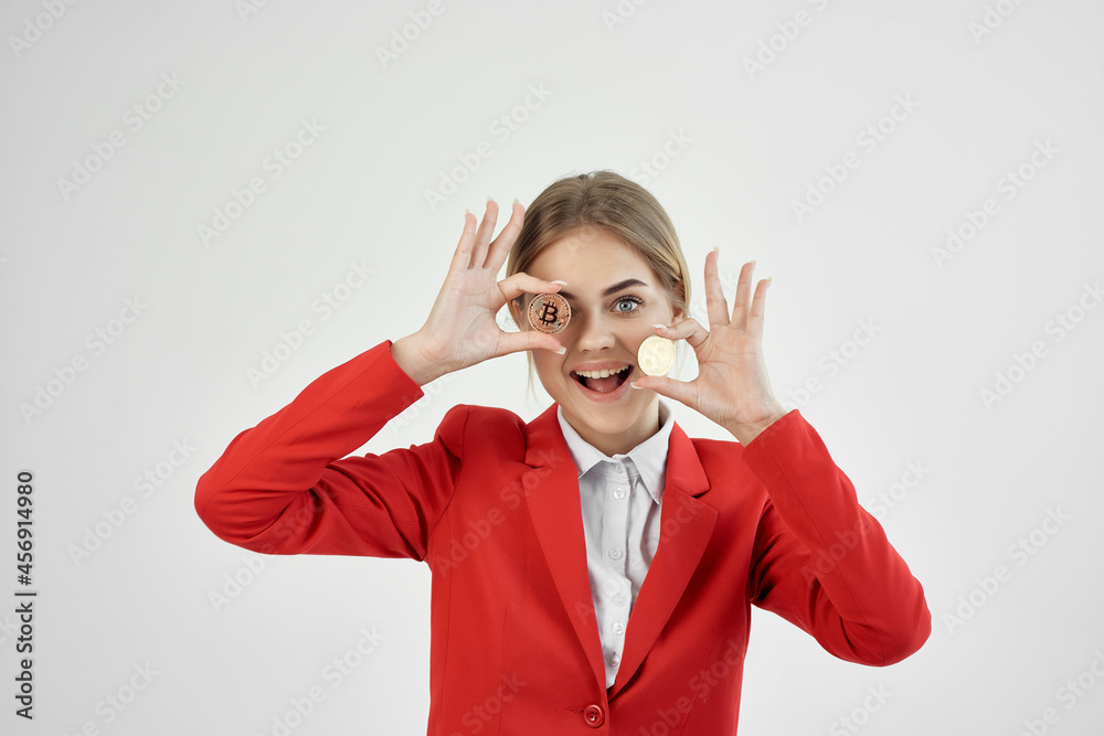 Businesswoman Bitcoin cryptocurrency in hands light background Businesswoman Bitcoin cryptocurrency in hands light background