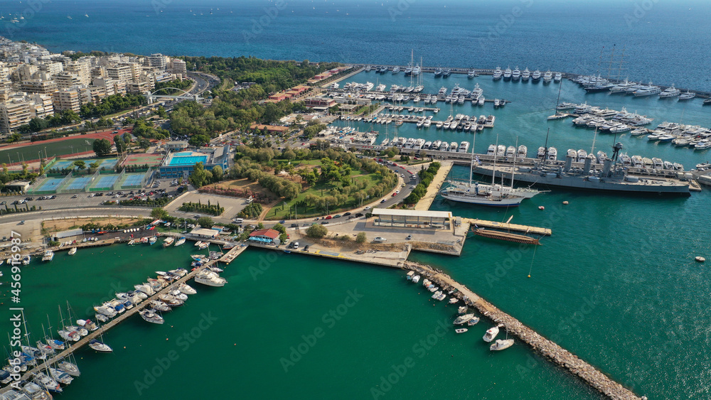 Aerial drone bird's eye view of small port and Park of Maritime Tradition where historic Averof warship is docked, Floisvos, Faliro Marina, Attica, Greece