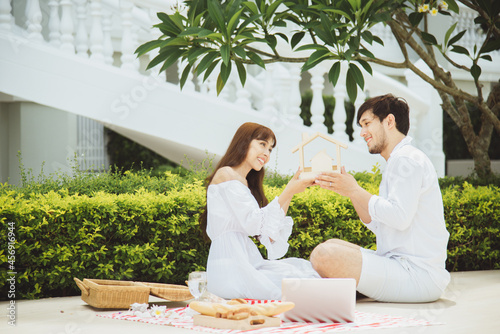 Asian young couple at picnic at the resort