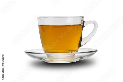 Side view transparent cup of hot tea isolated on white background.