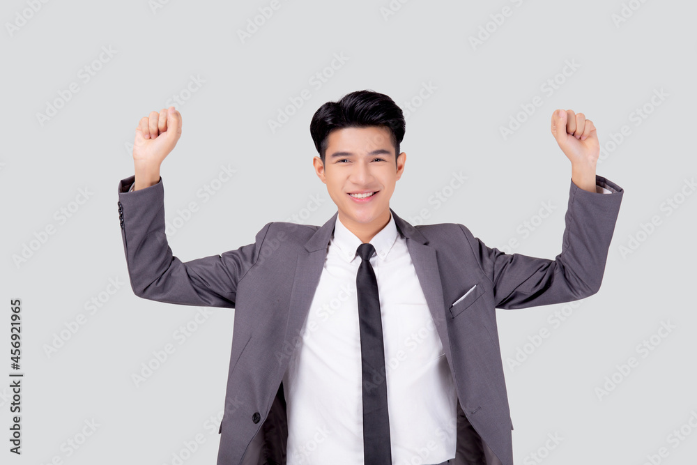Portrait businessman in suit standing with win success isolated on white background, young asian business man is manager or executive having confident and excited is positive, expression and emotion. Portrait businessman in suit standing with win success isolated on white background, young asian business man is manager or executive having confident and excited is positive, expression and emotion.