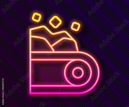 Glowing neon line Conveyor belt carrying coal icon isolated on black background. Vector
