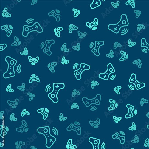 Green line Wireless gamepad icon isolated seamless pattern on blue background. Game controller. Vector