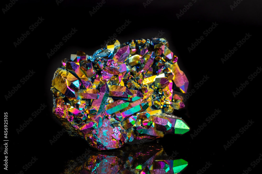 Macro mineral stone Titanium Quartz, Flame Aura Quartz on a black background