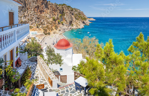 View over greek fishing village with beach, Kyra Panagia, Karpathos, Greek Islands photo