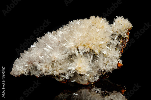 Macro mineral stone crystals Hemimorphite rock on a black background