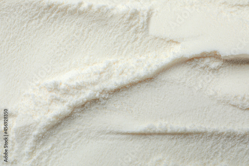 Photos Closeup view of powdered infant formula as background. Baby milk