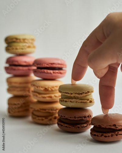 a bunch of macarons in a plate
