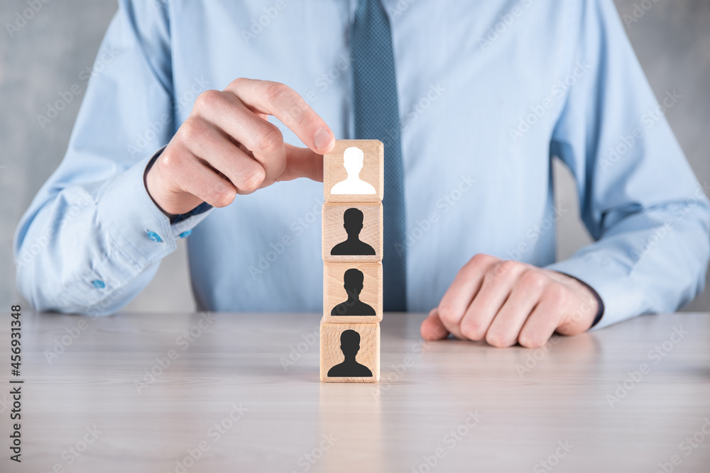 custom made wallpaper toronto digitalBusinessman hold and put wooden cube block shape with user icon on grey table. Space for text. Internet icons interface foreground. global network media concept,contact on virtual screens ,copy space