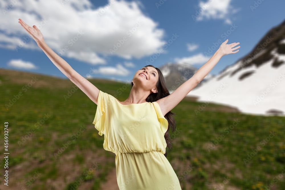 female hiker on top hills with arms out, cheering woman hiker open arms at the mountain peak female hiker on top hills with arms out, cheering woman hiker open arms at the mountain peak