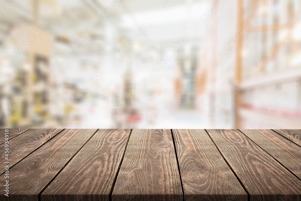 Empty wooden table in front of abstract blurred background. display of product Empty wooden table in front of abstract blurred background. display of product