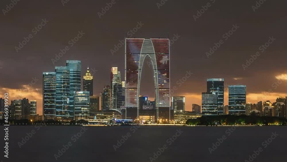 Modern buildings Jinji Lake Olympic Sports, Plaza Kewen Center Suzhou, jiangsu province, China. (time-lapse) Modern buildings Jinji Lake Olympic Sports, Plaza Kewen Center Suzhou, jiangsu province, China. (time-lapse)