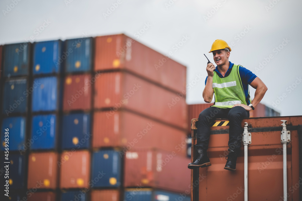 foreman or engineer are work in container shipping industry warehouse, logistic transport to import and export cargo at delivery storage port terminal, man are work to control a business box foreman or engineer are work in container shipping industry warehouse, logistic transport to import and export cargo at delivery storage port terminal, man are work to control a business box