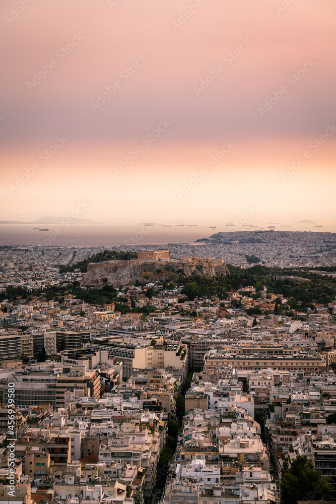 High angle view of Acropolis and Athens city in Greece at sunset from the Lycabettus Hill