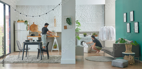 Two men living together, kitchen living room and washing machine laundry interior style, table chair sofa home design.