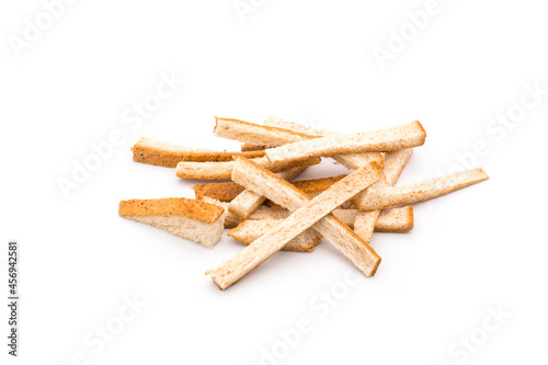 Bread crumbs or dried breadcrumbs on a white background