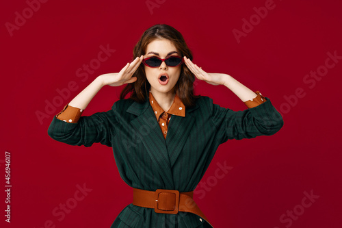 woman gesturing with hand open mouth fashion posing