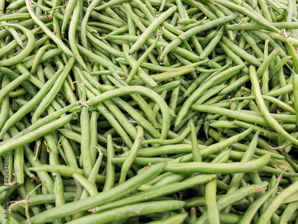Green bean produce display at local grocery store market. Green bean produce display at local grocery store market.
