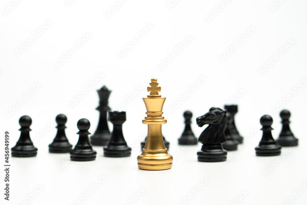 Golden Chess King standing to Be around of other chess, Concept of a leader must have courage and challenge in the competition, leadership and business vision for a win in business games Golden Chess King standing to Be around of other chess, Concept of a leader must have courage and challenge in the competition, leadership and business vision for a win in business games