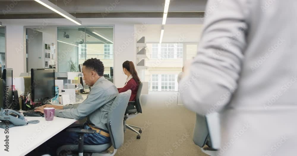 Busy activity in diverse business office with business people working multi tasking in workplace discussing growth ideas and networking