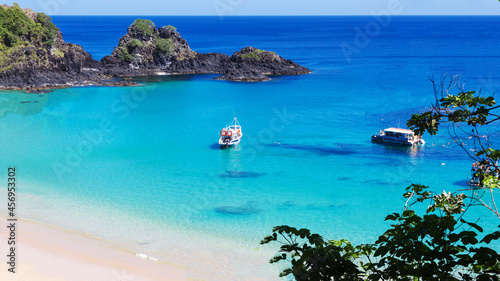 beach with water and blue sky