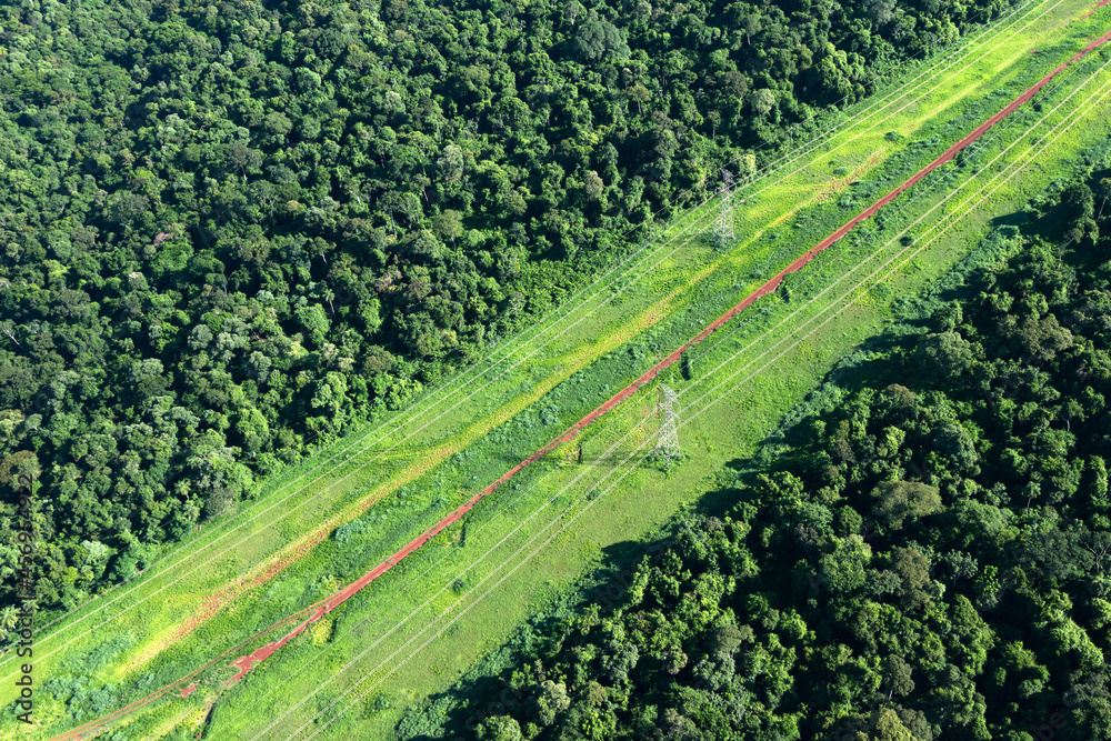 Aerial views of power lines through the jungle in Brazil. Aerial views of power lines through the jungle in Brazil.