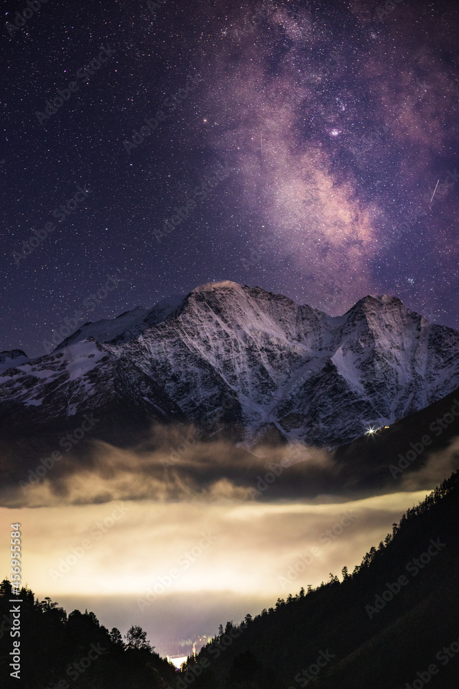 Milky Way over a mountain peak. Starry night sky