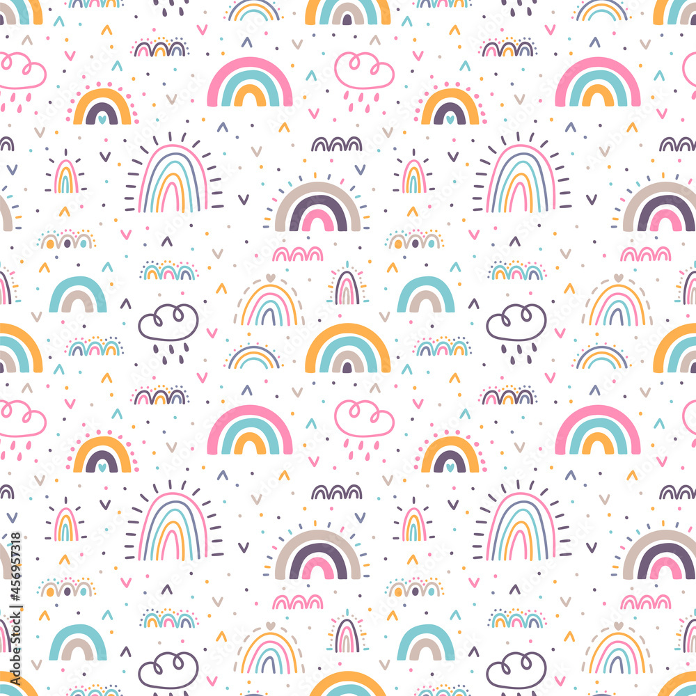Cute seamless pattern with rainbows. Hand drawn nursery design. Trendy baby texture for fabric, cloth, textile, wrapping paper