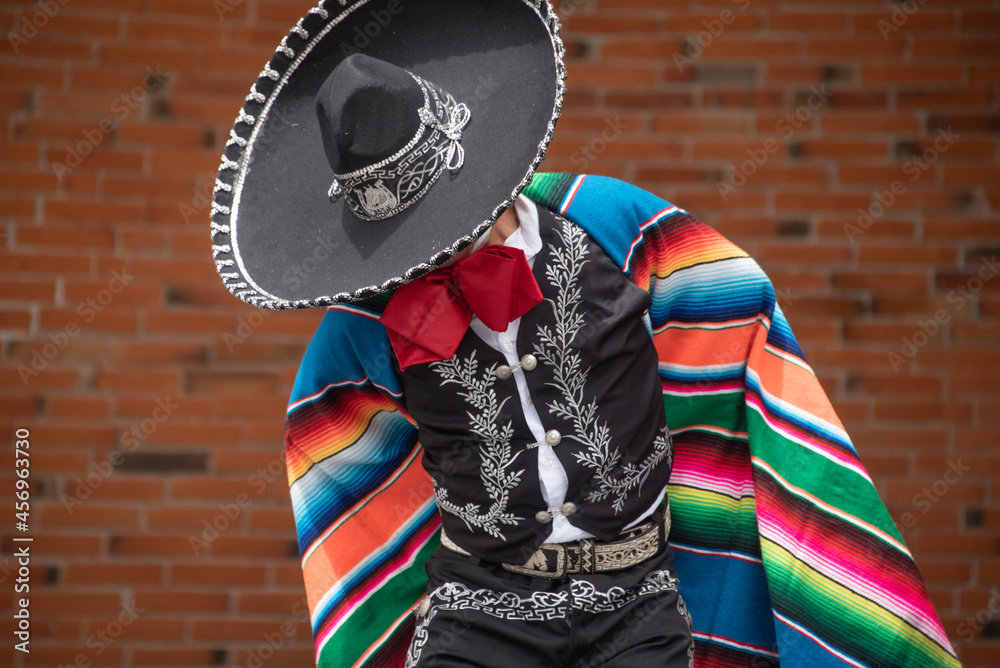Mexican charro with and multicolored serape from jalisco mexico with mariachi music Stock Photo | Adobe Stock