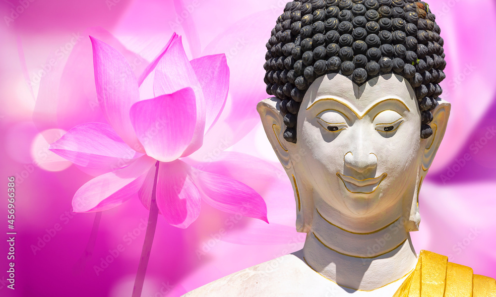 Buddha face on lotus flower background