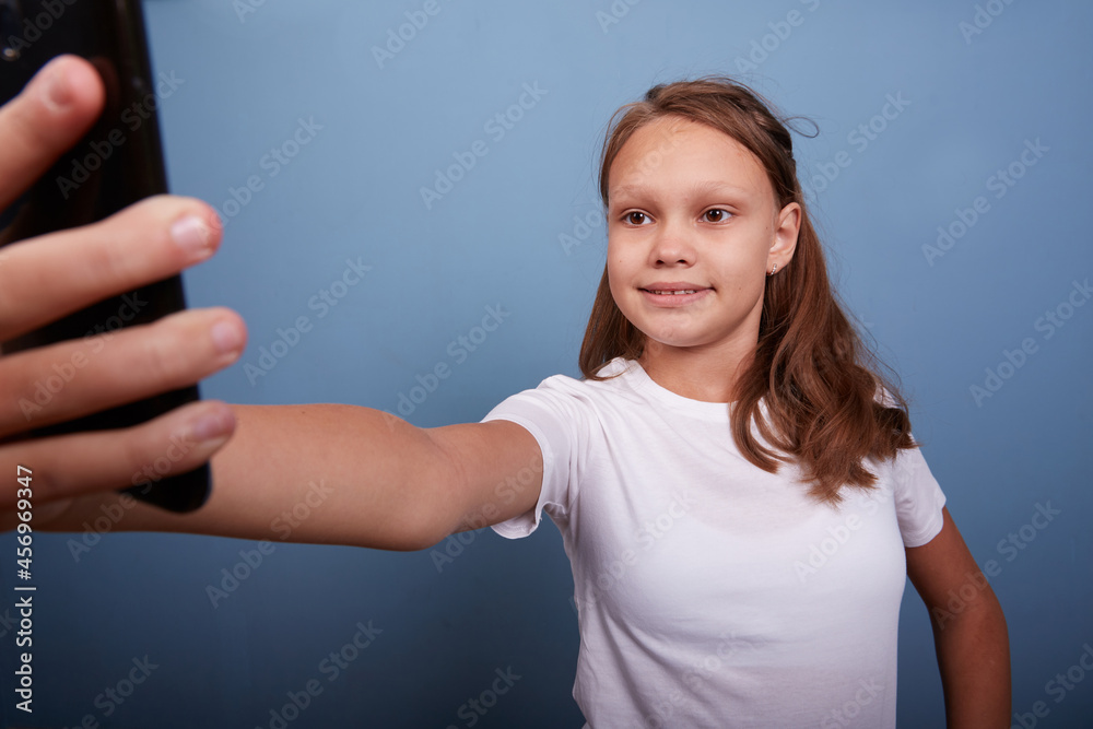 a beautiful girl of 11 years old takes a selfie a beautiful girl of 11 years old takes a selfie