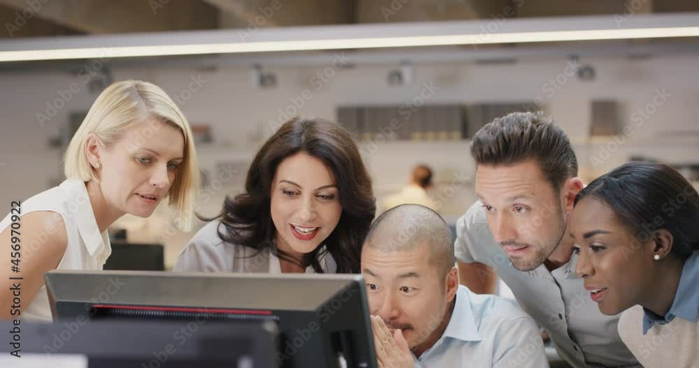 Diverse business team celebrating victory arms raised extreme happiness excitement at corporate success winning goal Diverse business team celebrating victory arms raised extreme happiness excitement at corporate success winning goal