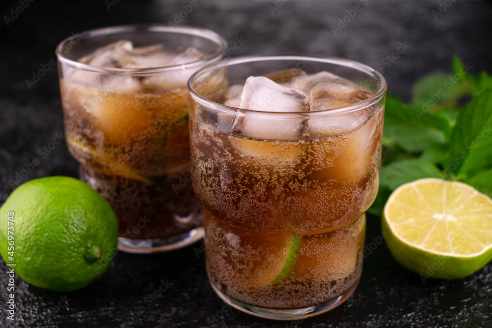 Cuba libre. Cola rum and lime drink.
Close-up. Cuba libre. Cola rum and lime drink.
Close-up.