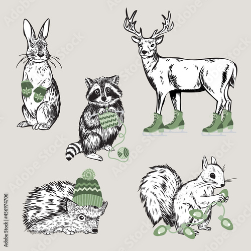 Set of five hand drawn vector forest animals with holiday themed items
