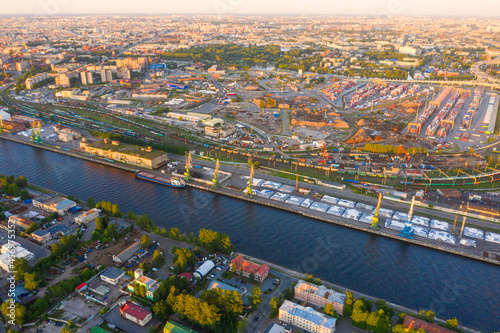 beautiful panorama of St. Petersburg and aerial view of cargo ship, cargo container in warehouse harbor in the Morskie Vorota district in St. Petersburg.