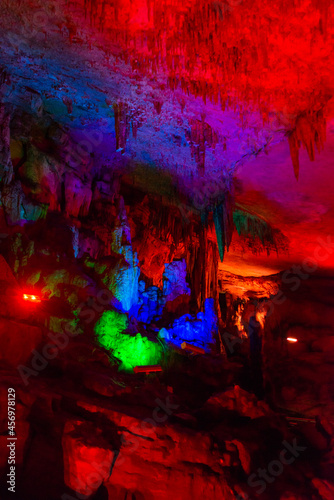 SATAPLIA, KUTAISI, GEORGIA: Sataplia cave in Georgia illuminated by colorful lights.