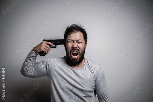 Asian handsome man angry on white background,Portrait of young Stress male concept