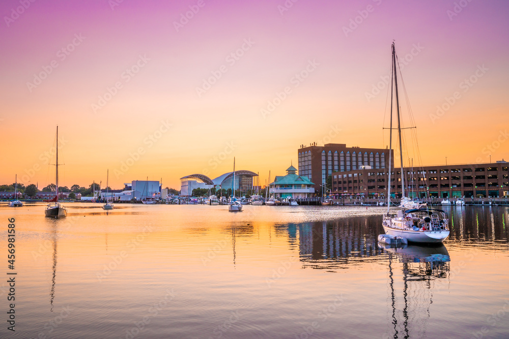 View of Hampton Virginia downtown waterfront district seen at sunset under colorful sky - obrazy, fototapety, plakaty 