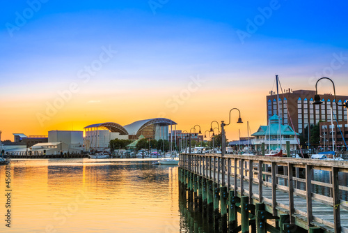 View of Hampton Virginia downtown waterfront district seen at sunset under colorful sky photo