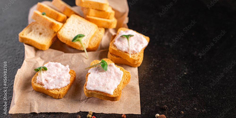 Smorrebrod seafood sandwich fish butter spread shrimp on bread capelin caviar taste fresh portion ready to eat meal snack copy space food background rustic Smorrebrod seafood sandwich fish butter spread shrimp on bread capelin caviar taste fresh portion ready to eat meal snack copy space food background rustic