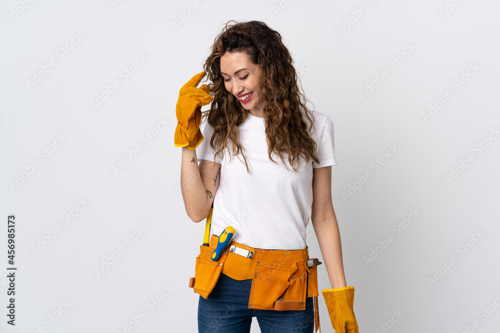 Young electrician man isolated on white background laughing Young electrician man isolated on white background laughing