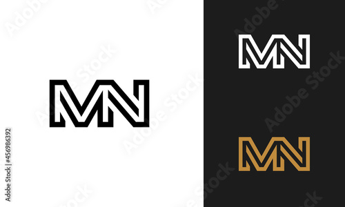 Minimal, modern gold. black and white-colored MN letter logo monogram