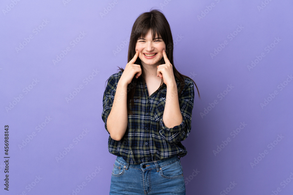 Young Ukrainian woman isolated on purple background smiling with a happy and pleasant expression Young Ukrainian woman isolated on purple background smiling with a happy and pleasant expression