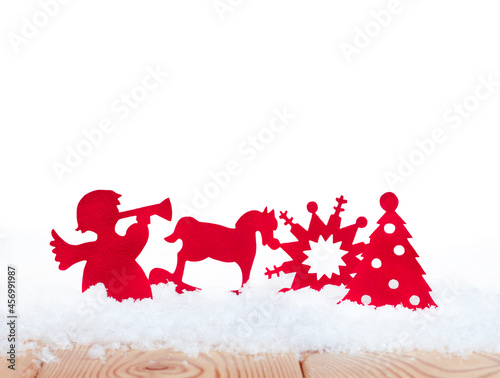 isolated christmas toys in the snow on the white background with copy space