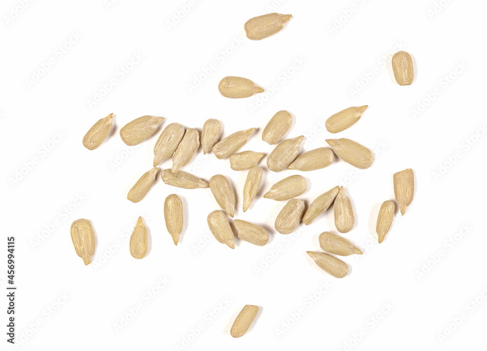 Peeled sunflower seeds isolated on white background, top view Peeled sunflower seeds isolated on white background, top view