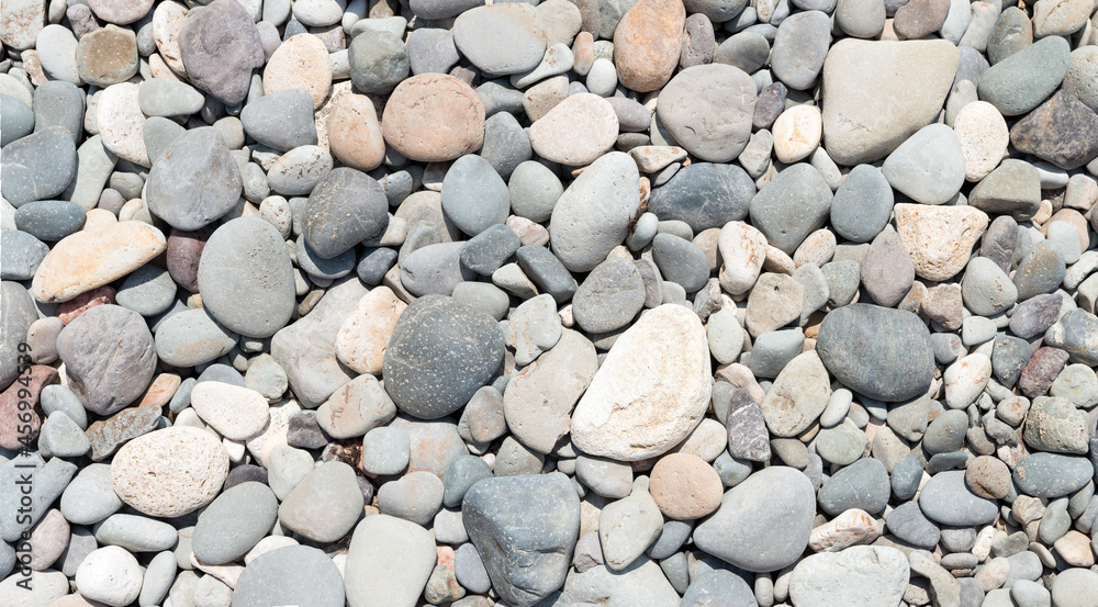 Close-up view of different pebble as background. Close-up view of different pebble as background.